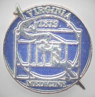 The pin given to students by the faculty at the Medical School Convocation