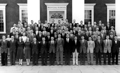 The medical school class of 1959 gathers on the steps of the Medical School.